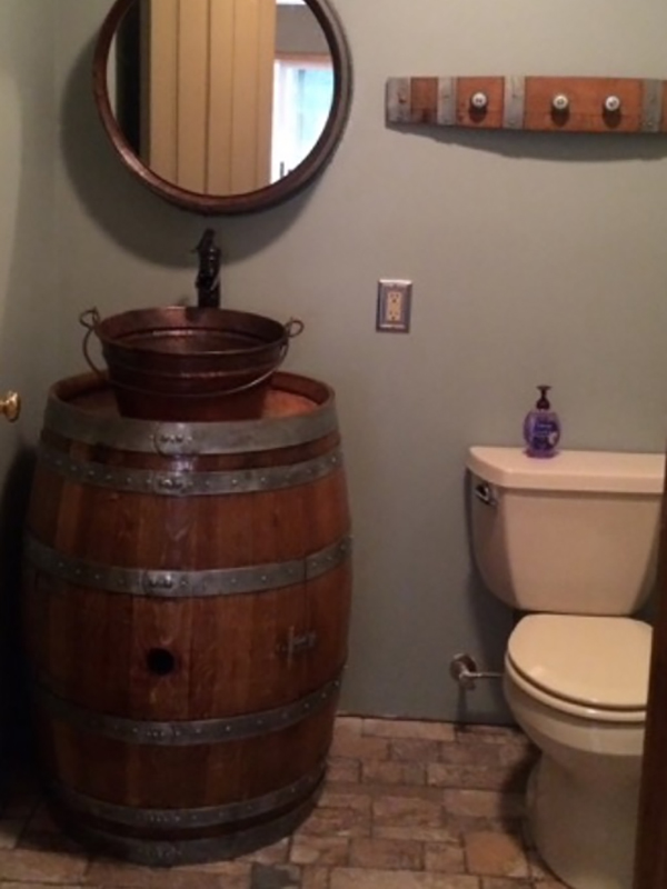 Wine barrel sink mirror and towel rack made to order